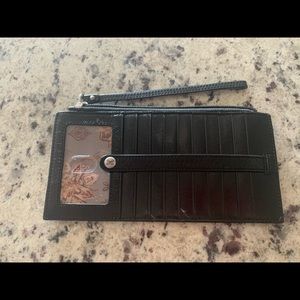 Hobo wallet with wrist strap .